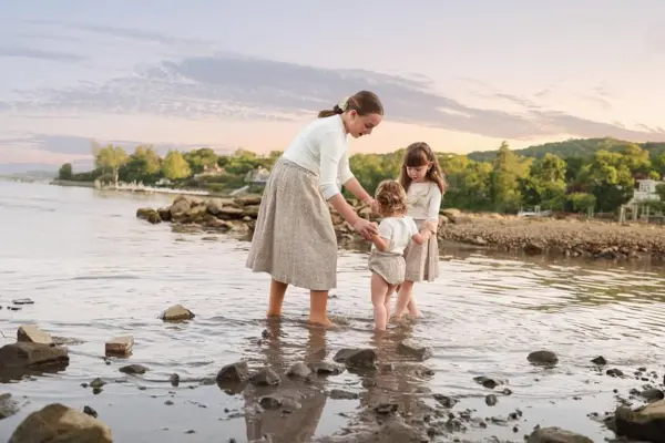 Mother and children wading at the shore at sunset, outdoor photography by Photoholic, Rockland County NY